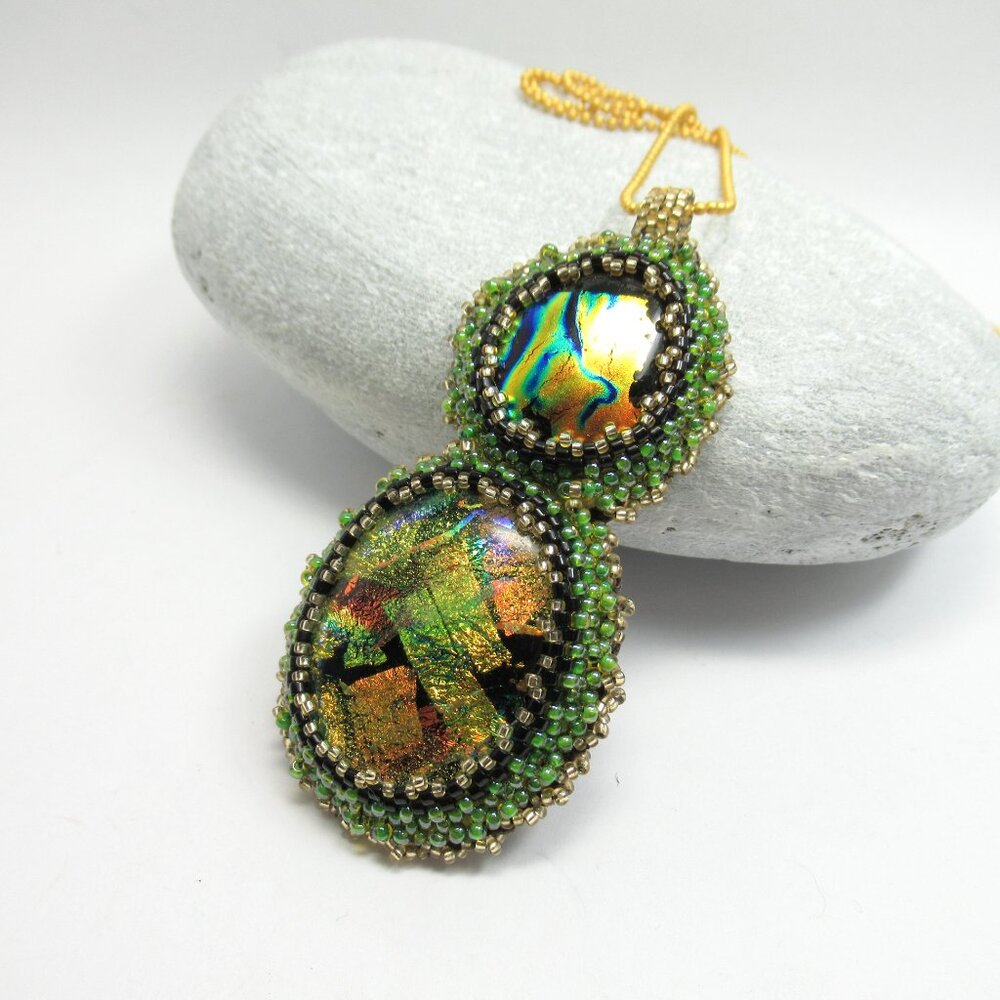 Hand embroidered pendant